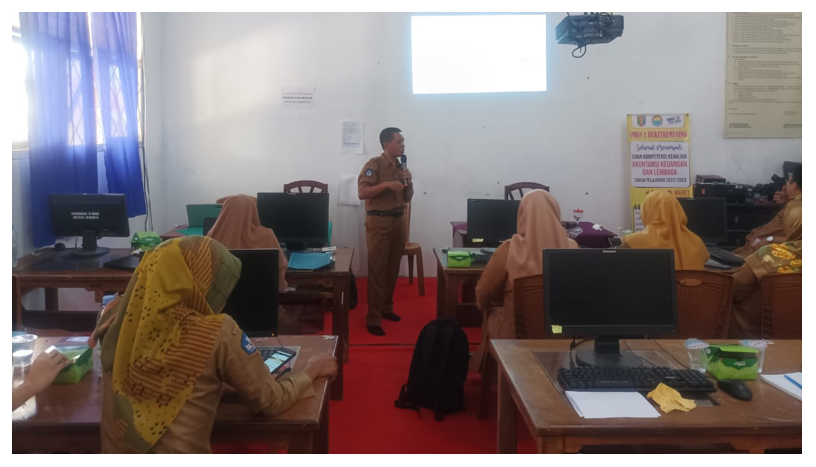 Berbagi Visi Pendidikan, SMK Negeri 2 Banjit Memimpin Sosialisasi eRapor di SMK Negeri 1 Bukit Kemuning